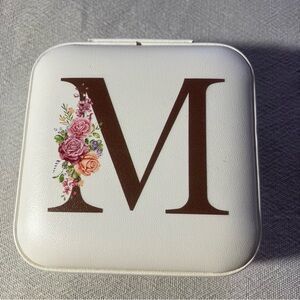 Travel jewelry case monogrammed "M"
